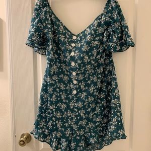 Green floral ruffled romper